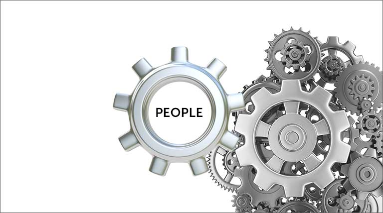 People gear connected to a large mass of other gears